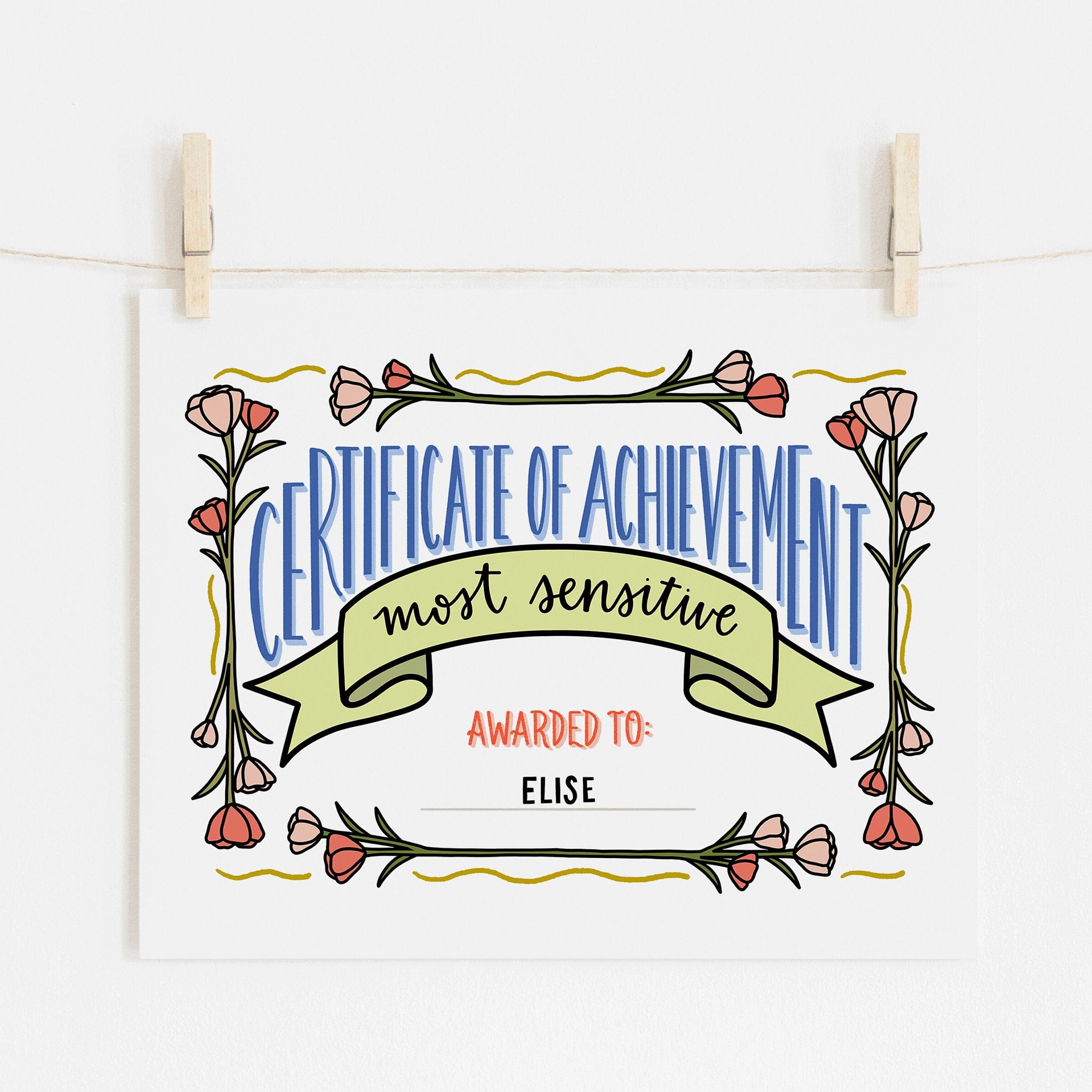 An 8x10 Certificate of Achievement art print to give to yourself or a friend with decorative elements on a white background that says 'most sensitive