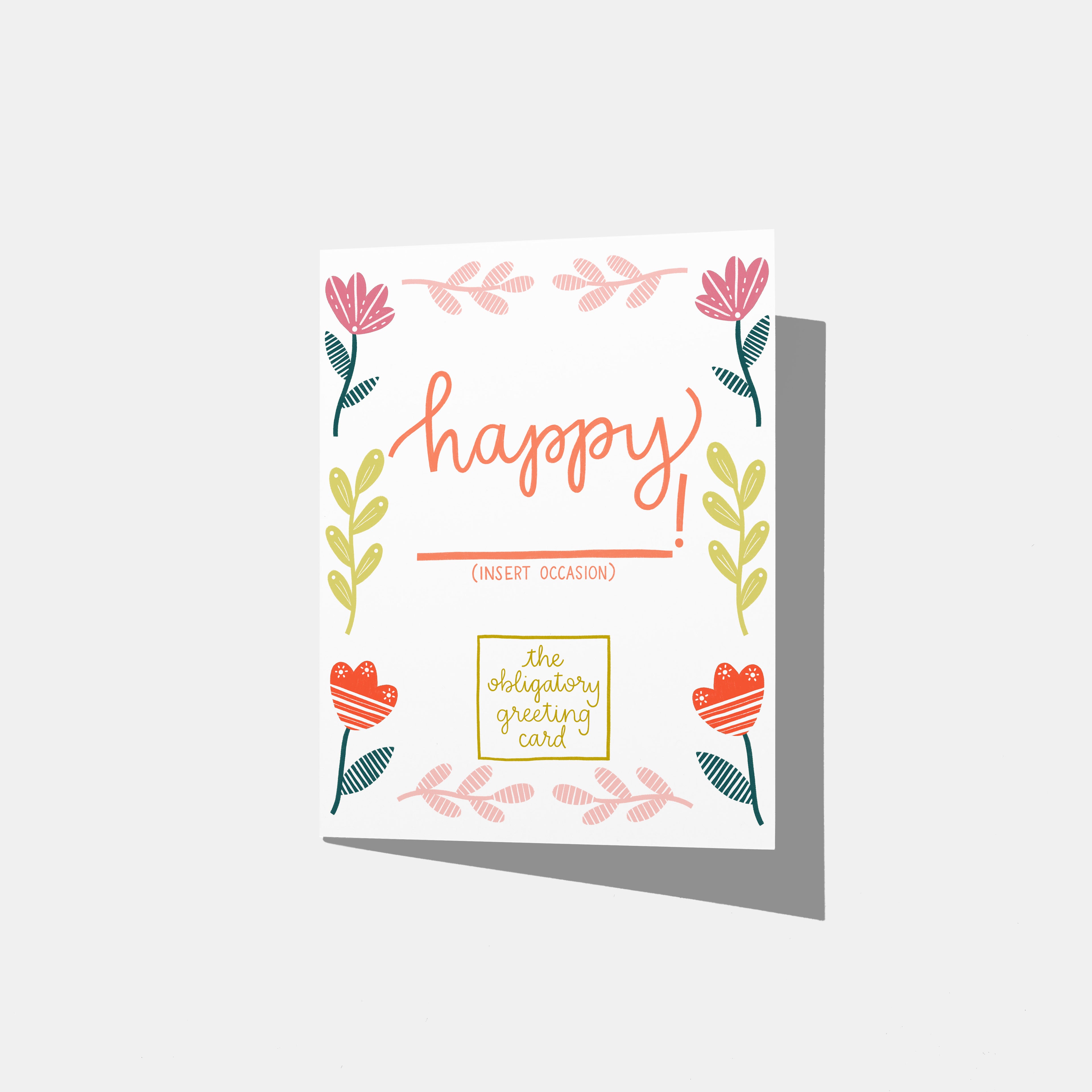 A mockup of a greeting card that says 'happy; with a blank under it that says '(INSERT OCCASION)!' There is a border of leaves and flowers and at the bottom is a square that says 'the obligatory greeting card' inside.