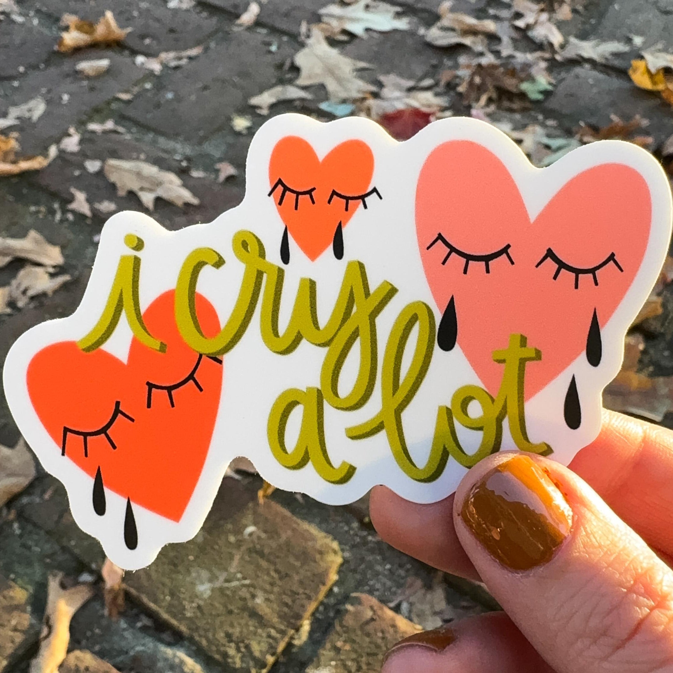 Stickers with hearts with eyes closed and text 'I cry a lot'.