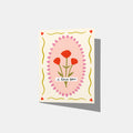 A mockup of a greeting card that has a pink oval in the middle with flowers. On top of that, it says 'i love you'. There is a border of yellow wavy lines and red hearts.