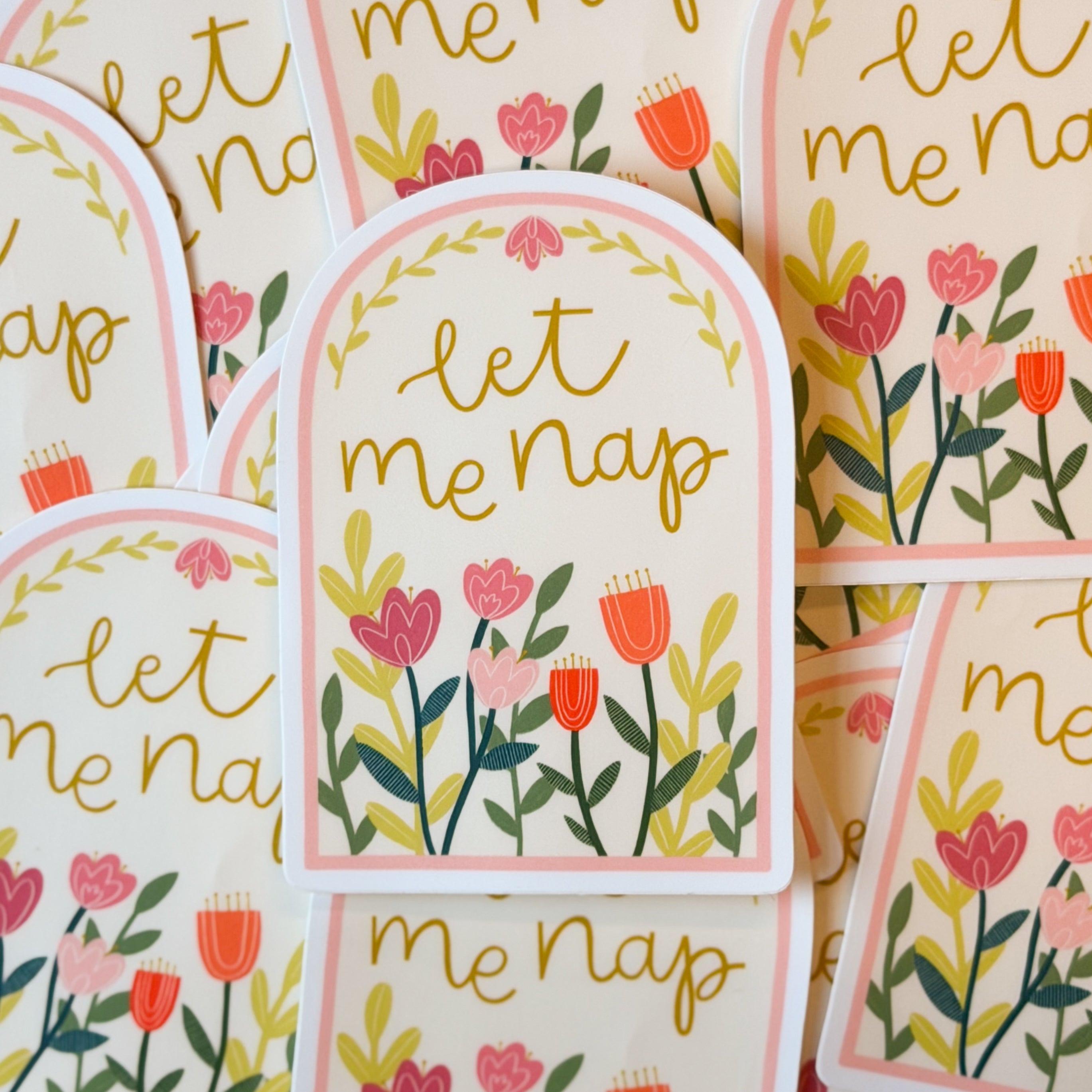 Floral stickers with 'let me nap' text on an off white background