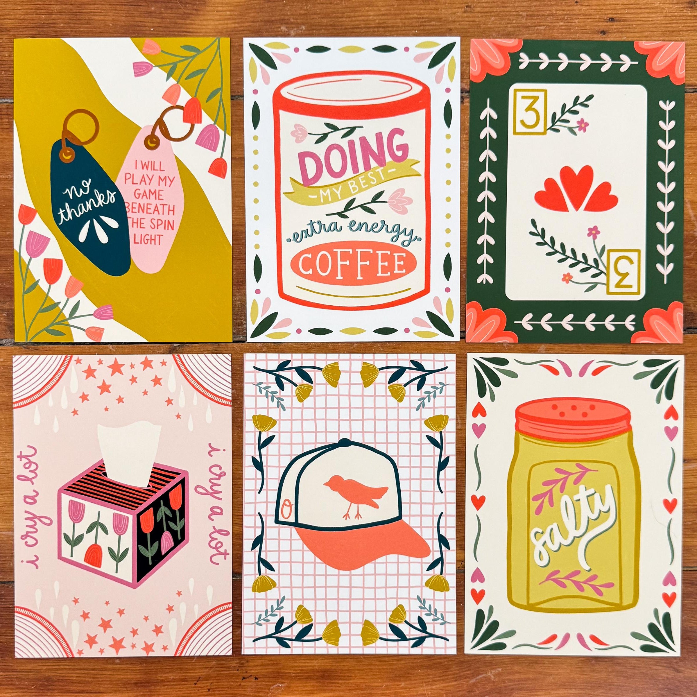 A lot of 5x7 art prints showing six different designs.