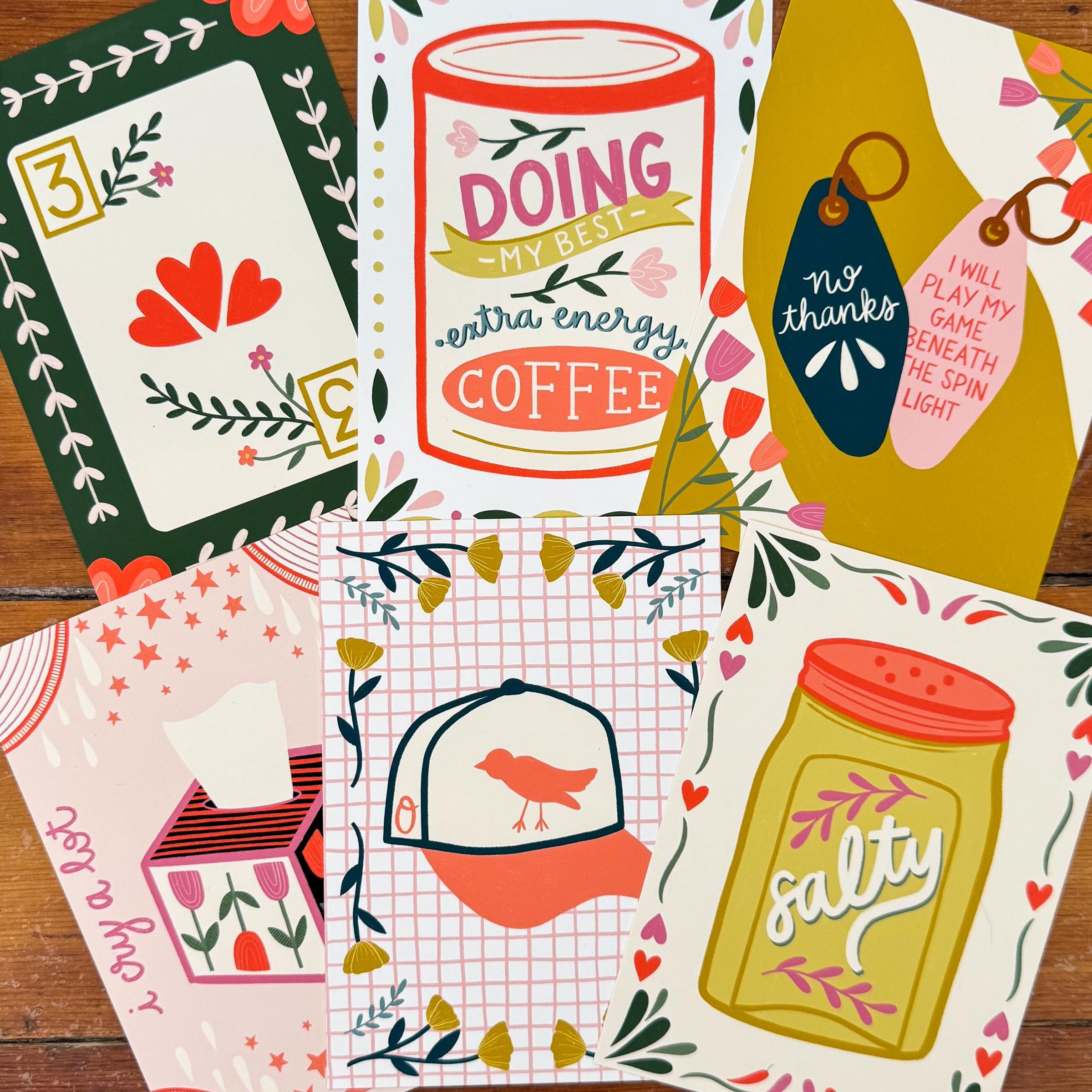 A lot of 5x7 art prints showing six different designs.