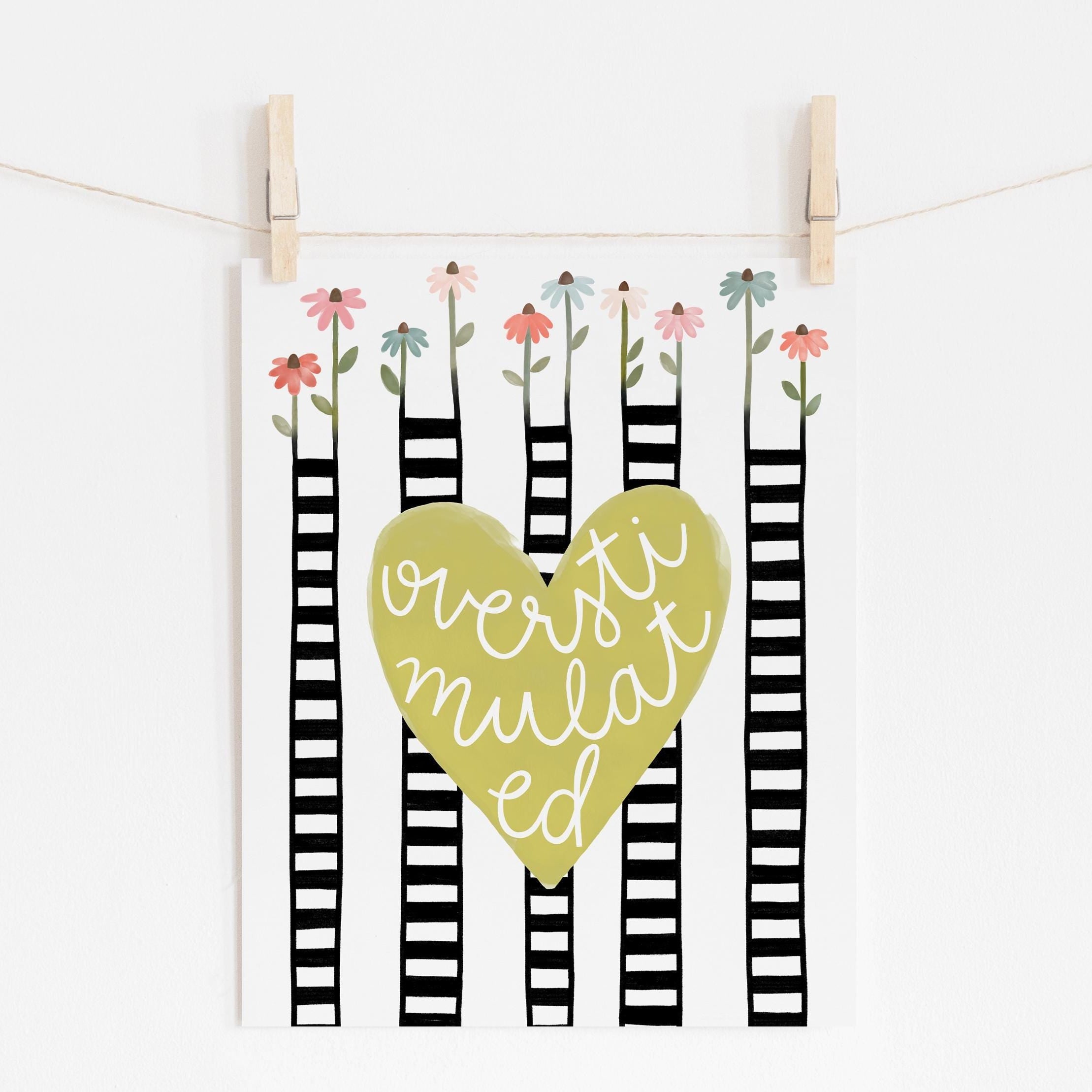 8x10 print with a yellow heart in the middle that says 'overstimulated'. The background has flowers coming from black and white striped stems.