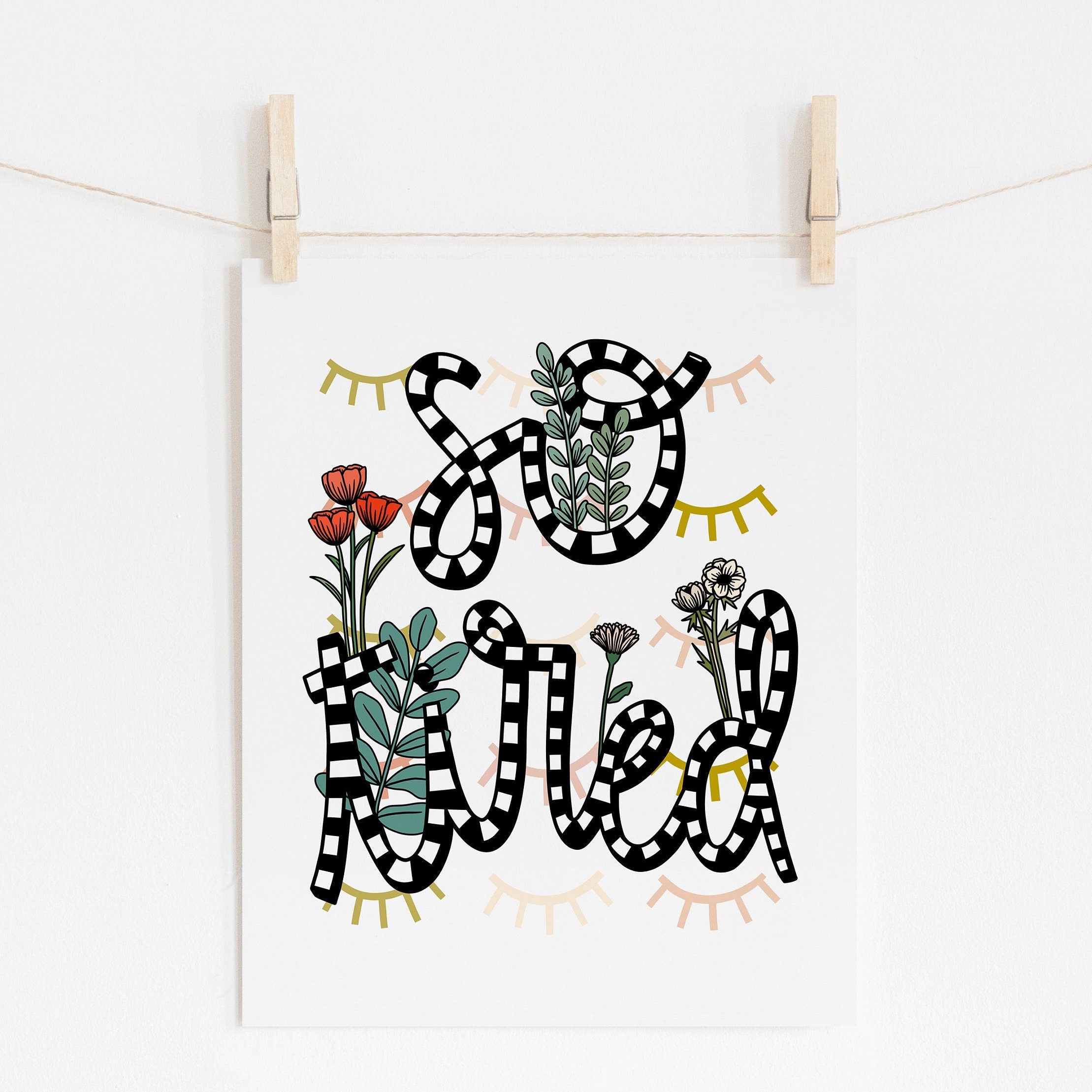 An 8x10 art print that says 'so tired' in black and white with flowers and eyes closed printed in the background.