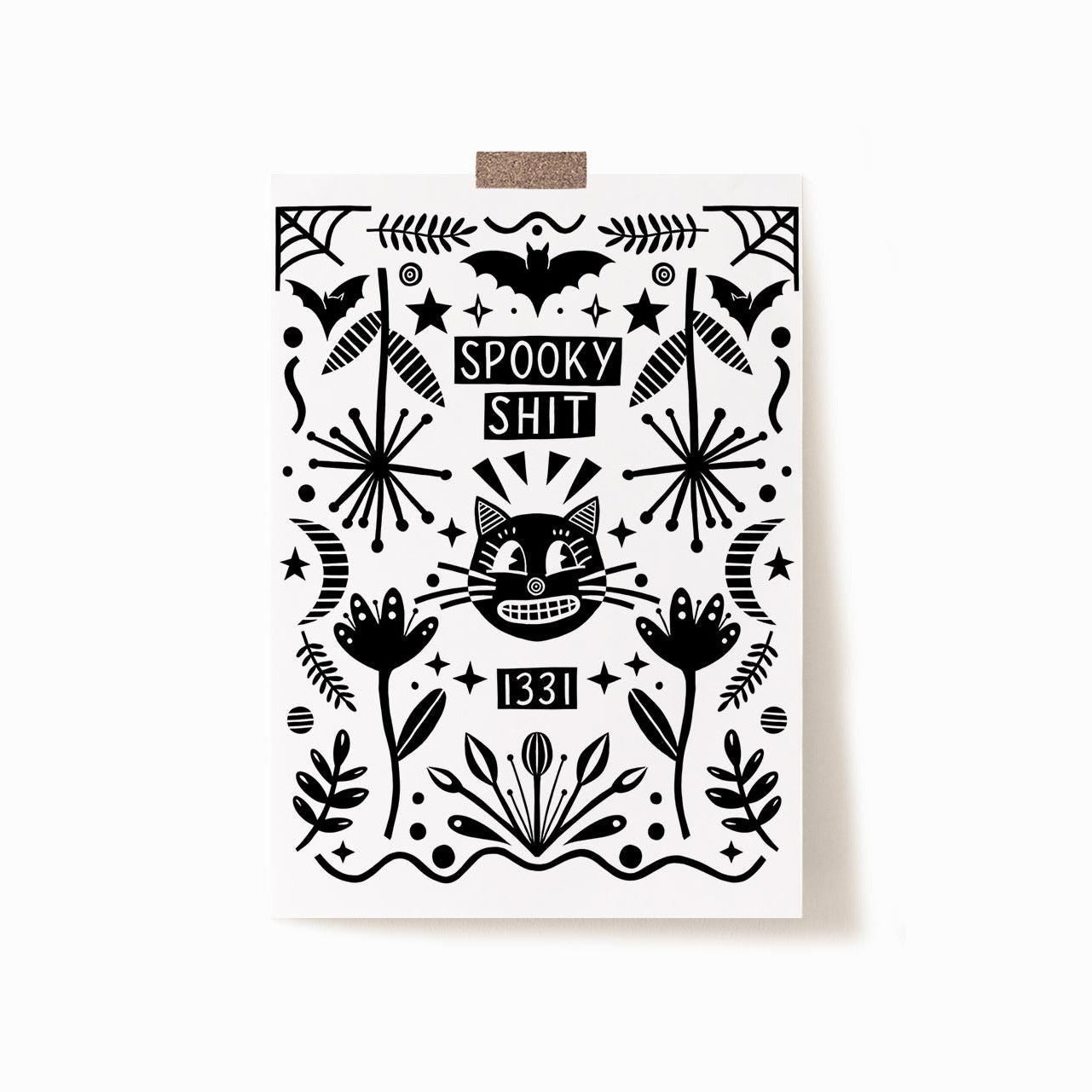 A 5x7 black and white art print that says 'SPOOKY SHIT' on the top with '1331' at the bottom, with a cat in the middle, surrounded by whimsy illustrations.