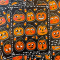 A pile of sticker sheets with vintage pumpkins and candy corn on them.
