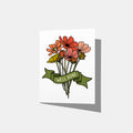 A mockup of a greeting card of a bouquet of orange, peach, and yellow flowers with a green banner that says '-WELL DONE-'.