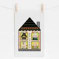 An 11x17 art print of a house that shows a different scene in each window. The bottom one has text that says 'you'll be safe here'.